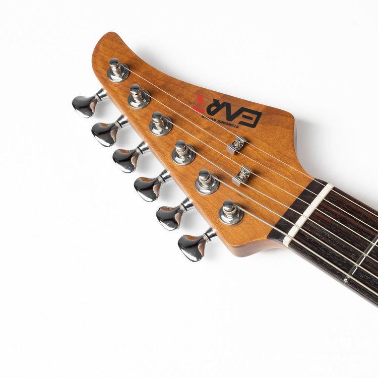 dmx9_gold_headstock_front EART Guitars, DMX-9, NK-S Standard Shape 2-Point Synchronized Steel Saddle Tremolo Bridge Electric Guitar, Gold