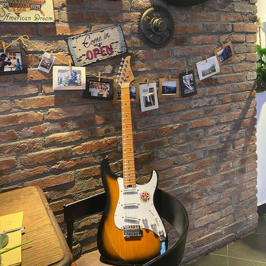 EART_electric_guitar_EAT-1_leans_on_a_vintage_wall Eart guitars, EAT-1, Model High Power Mini Humbucker Electric Guitars, Sunburst